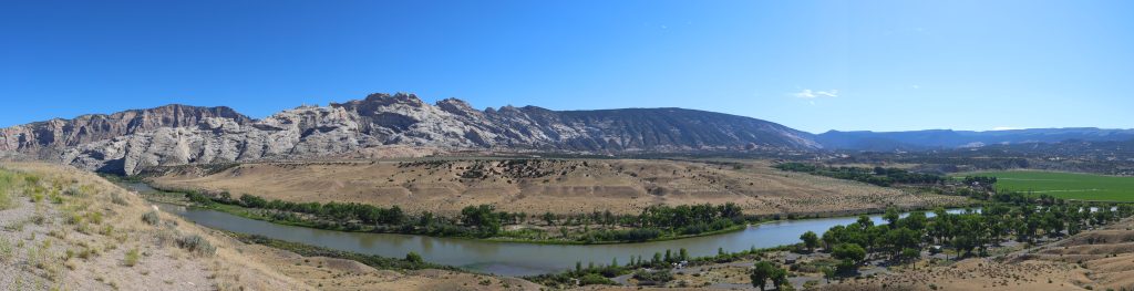 The campground is to the bottom right, the Green river stretching left to right, and the anti-cline in the background.