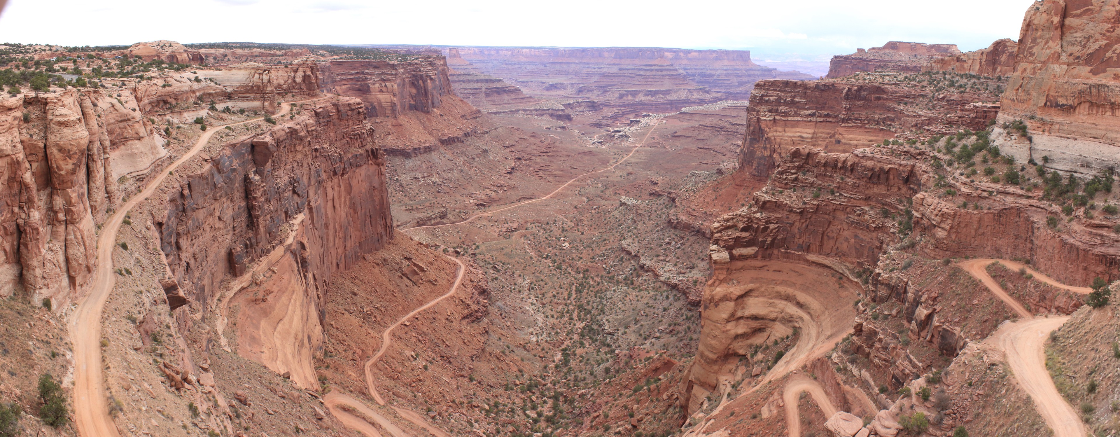 The Trail to the Colorado. Looking southeast from the 'Island in the Sky' mesa, this is the Jeep/Motorcycle trail leading to the Colorado Branch of the Canyonlands.