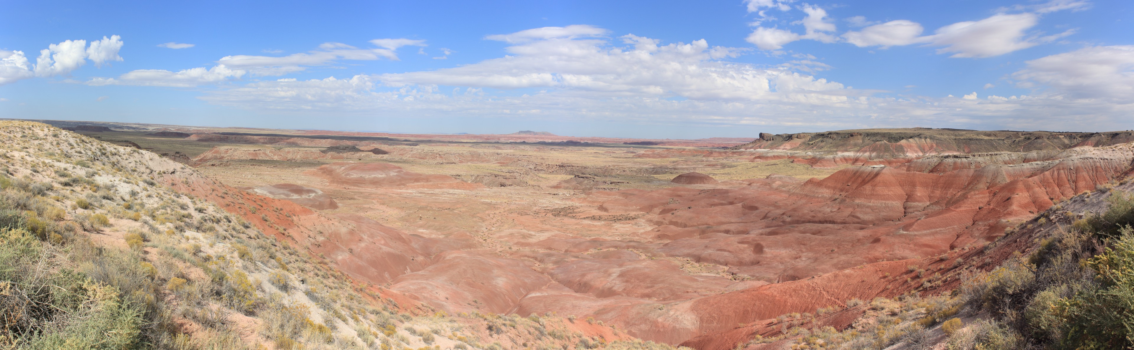The Painted Desert. A little more sun than the northern most view. Here is a valley opening up into the Painted Desert.